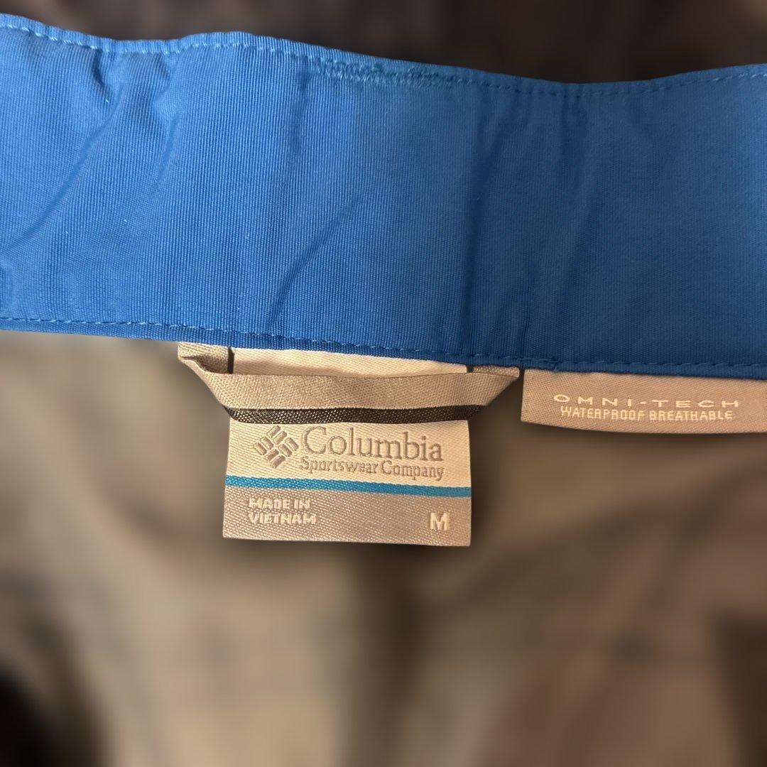 コロンビアの防水フード付き極暖のスキーウェア グレー(ダウン)と青のパンツ